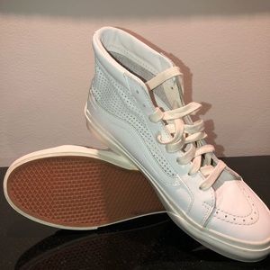 White leather high top vans